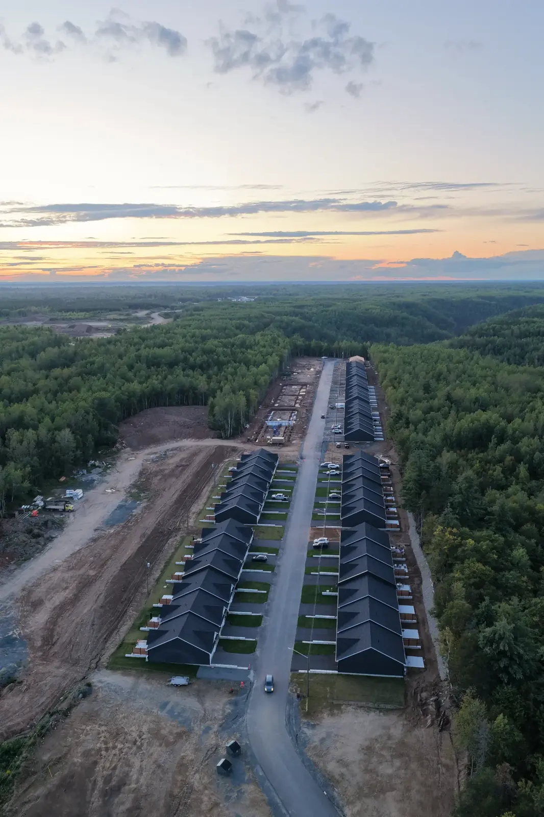 Evening aerial view along The Cove Living community