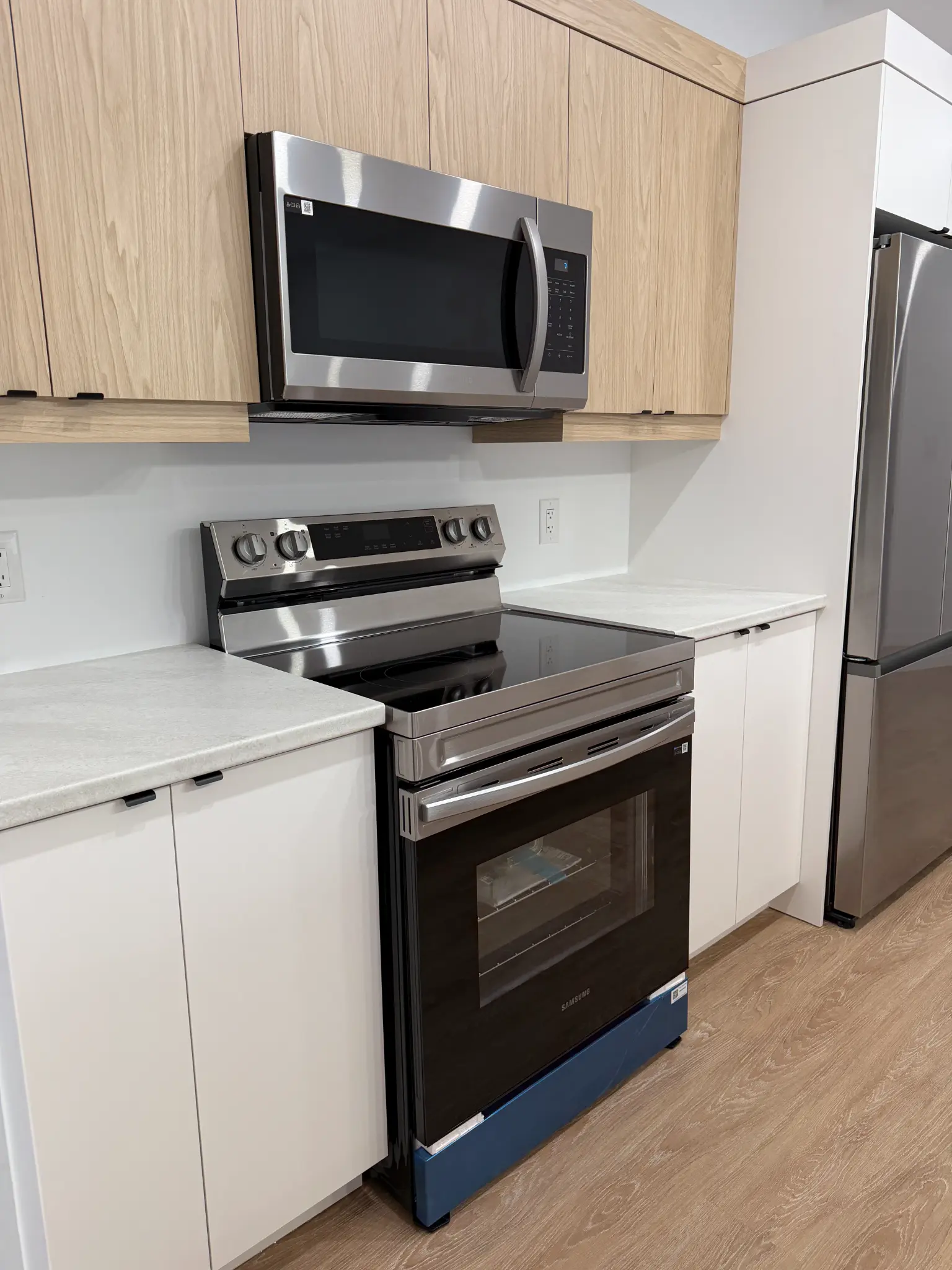 Samsung stainless steel stove, microwave, and fridge
